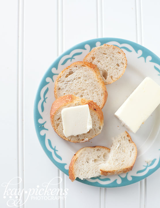 bread and butter on teal plate